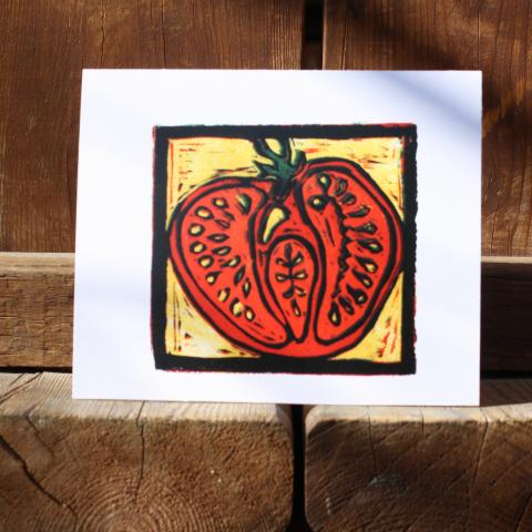 Card showing a sliced open tomato
