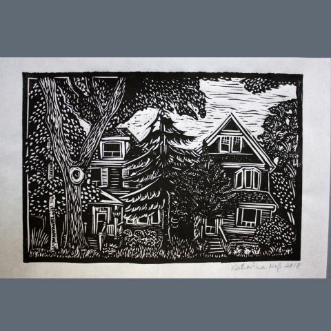 Linocut print of houses with trees