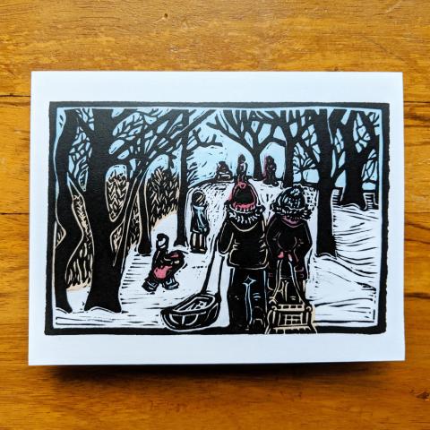 Card showing kids sledding