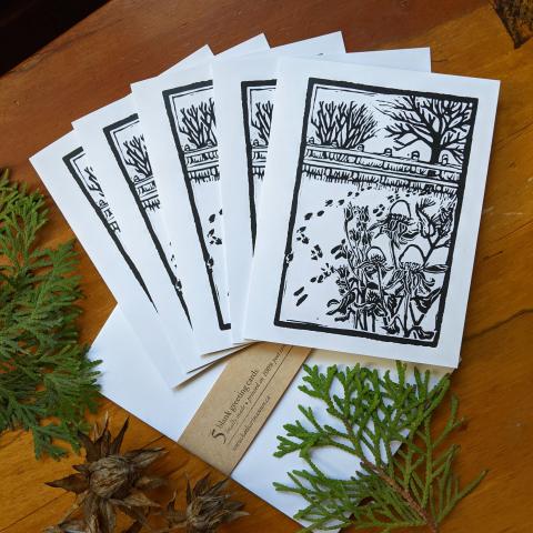 Set of 5 cards showing a garden in the winter, fanned out