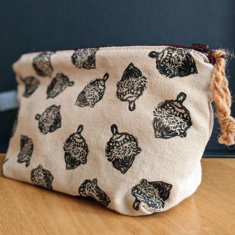 Zippered pouch, dyed and printed with acorns
