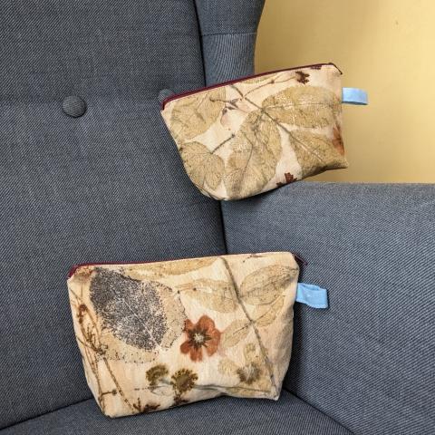 two eco-printed zipper pouches