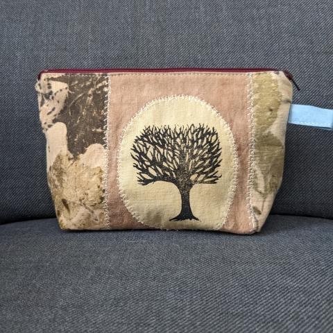 Zippered pouch with a tree linoprint