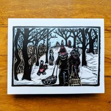 Card showing kids sledding