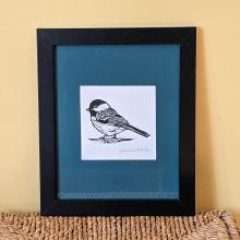 Framed print of a chickadee
