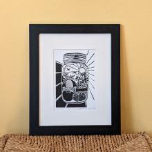 Linocut print of a mason jar full of summer things like gardening and camping