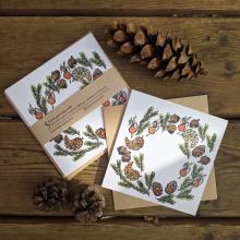 pack of 5 square cards with envelopes, showing a wreath of pine cones