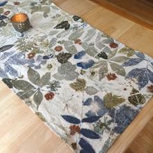 Eco-printed table runner with candle