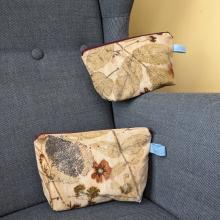 two eco-printed zipper pouches